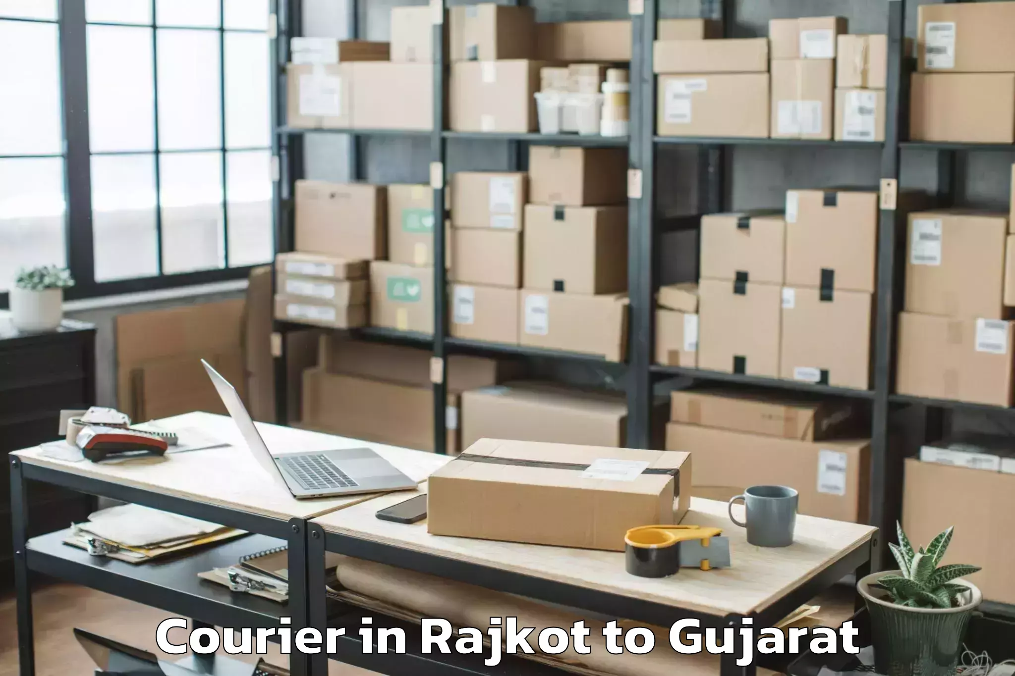 Get Rajkot to Shehera Courier